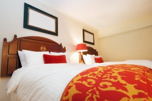 Double bed in the modern interior room